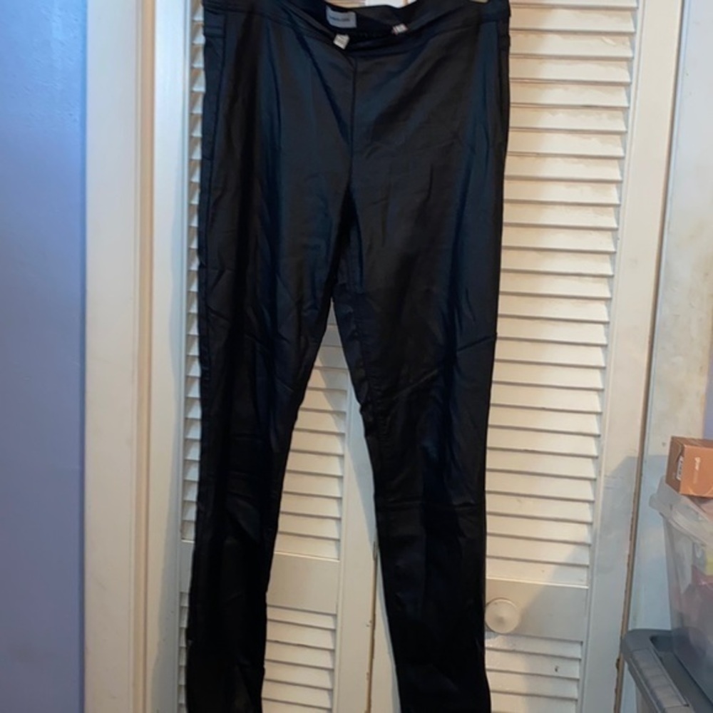 Sneak Peek Black coated leggings with ankle zipper
